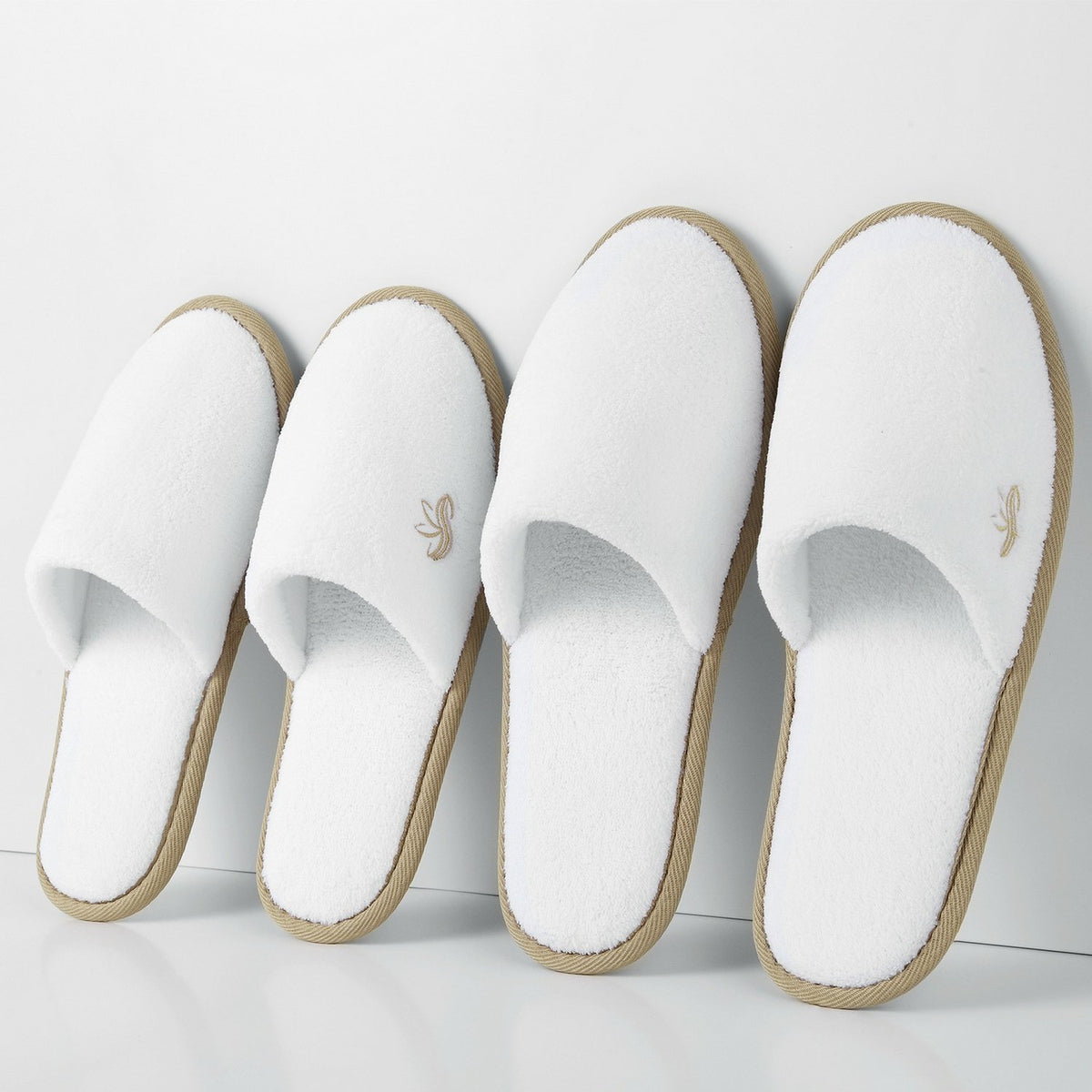 BERGMAN KELLY disposable slippers come individually wrapped for hygienic guest turnover.