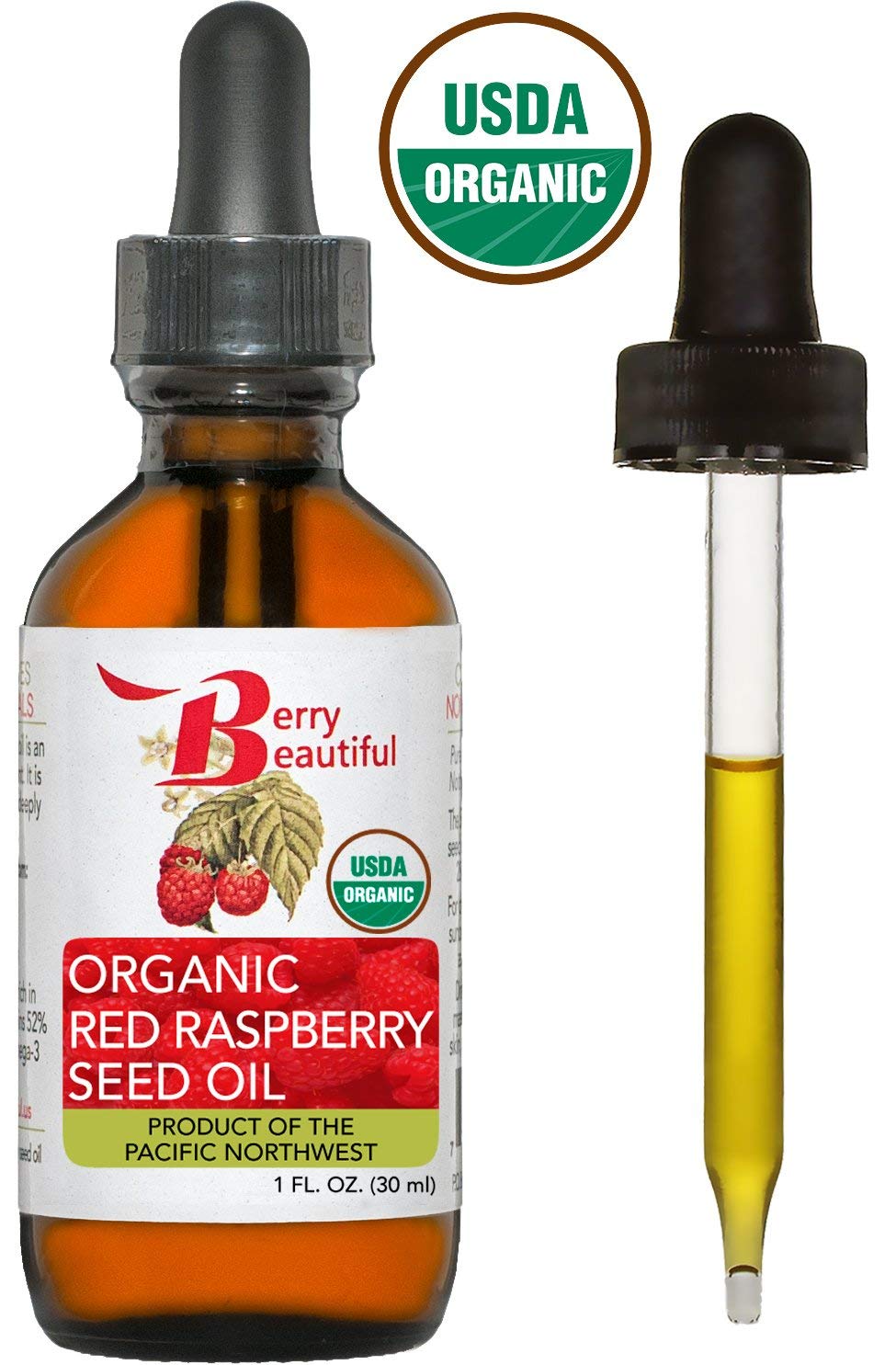 Close-up of Berry Beautiful organic label on raspberry seed oil bottle