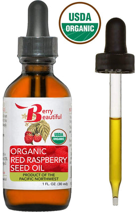 Close-up of Berry Beautiful organic label on raspberry seed oil bottle