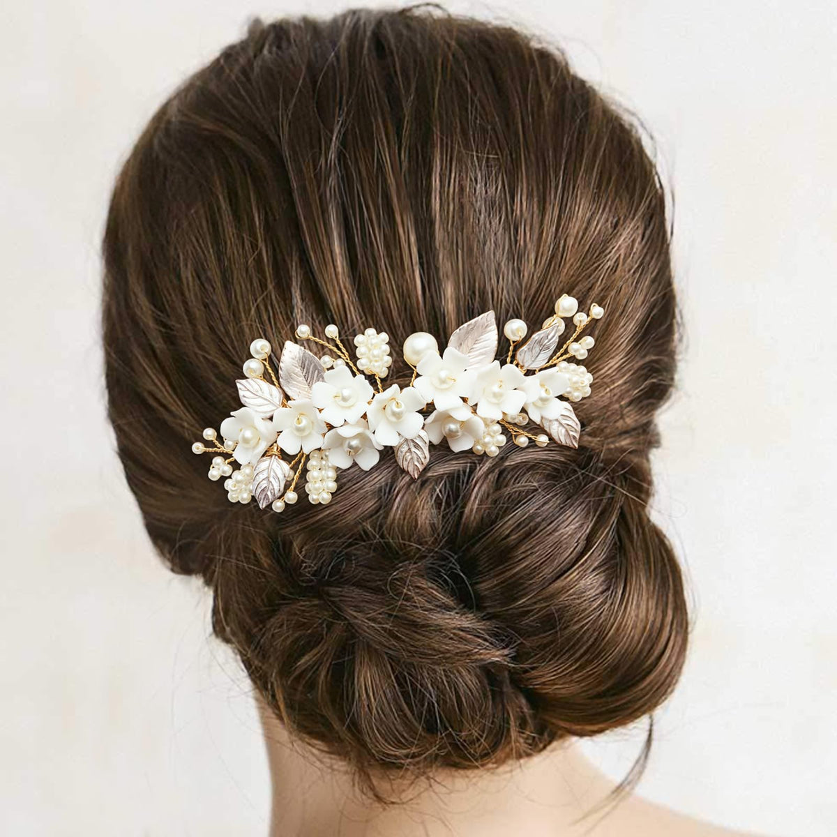 BETITETO ceramic flower hair pin highlights a delicate bridal detail for photos.