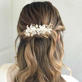BETITETO ivory pearl leaf hairpiece complements romantic wedding hairstyles.