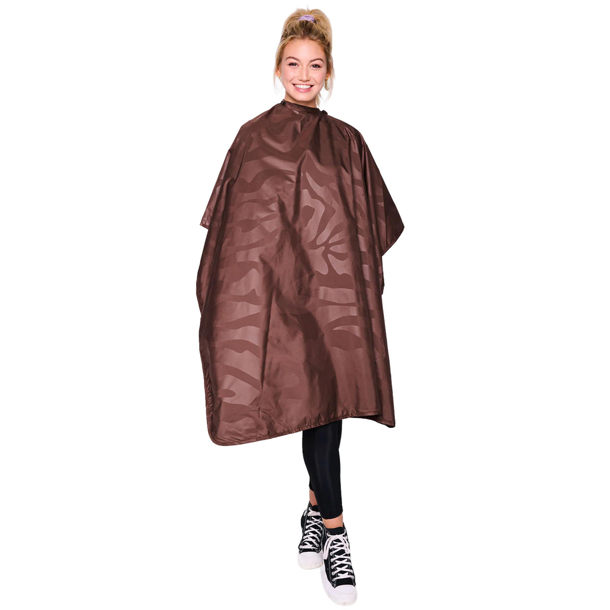 Betty Dain bleach-proof styling cape deflects bleach splashes during treatments