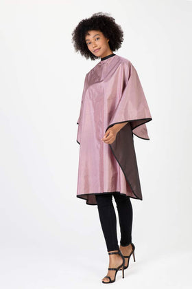 Betty Dain Reversi cape offers generous 50 x 60 inch coverage for diverse clients.