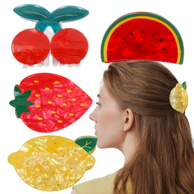 Bgffuy Fruit Claws Strawberry clip secures thicker hair with a playful red accent.