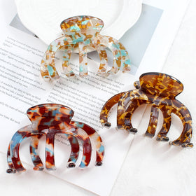 Bgffuy oversized claw clip provides secure hold for thick, heavy hair.