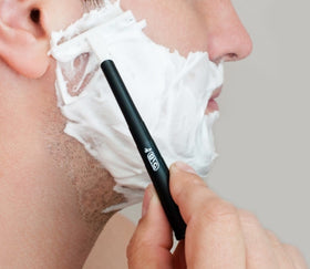 BIC razor head close-up highlighting durable blades and smooth glide.