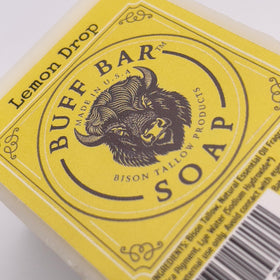Label highlights natural ingredients: bison tallow and essential oils.