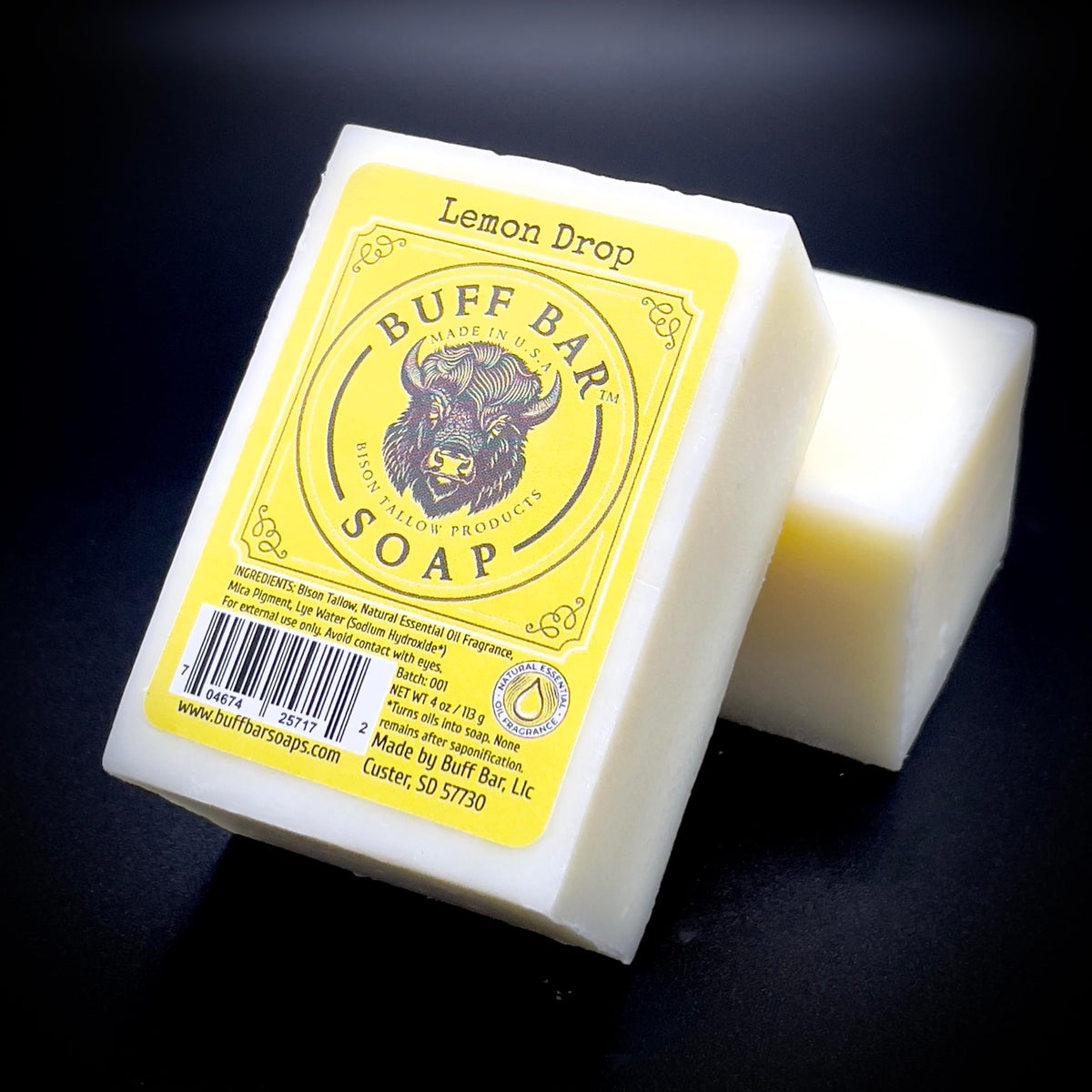 Soap beside shower area for easy daily cleansing.