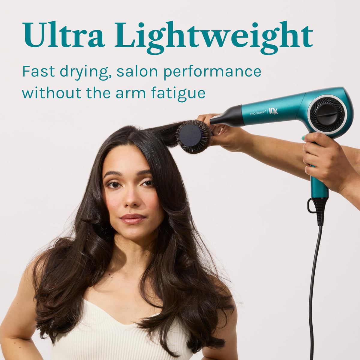 Detangling comb attachment on Bio Ionic 10X Ultralight Dryer for curl elongation
