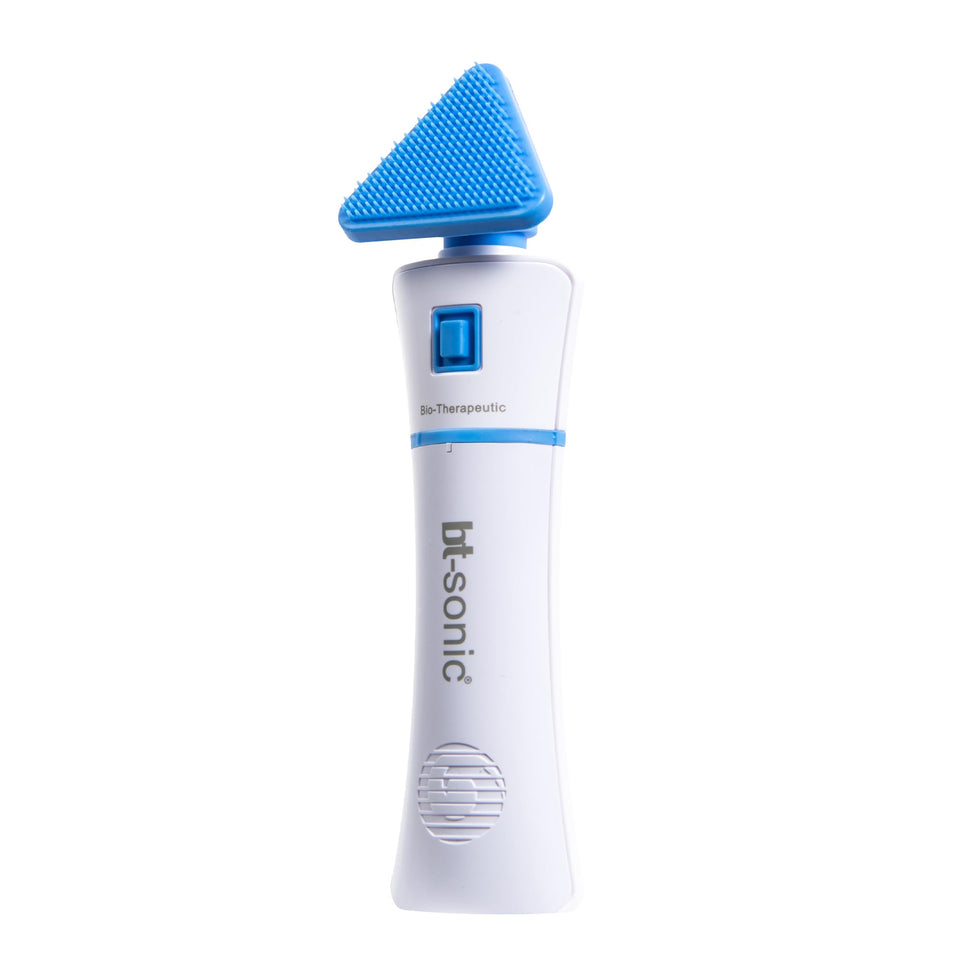 Bio-Therapeutic bt-Sonic triangular head cleanses facial contours for targeted pore refreshment.