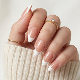 Bioday French Tip nails in medium almond with glossy base for a chic, salon-like finish.