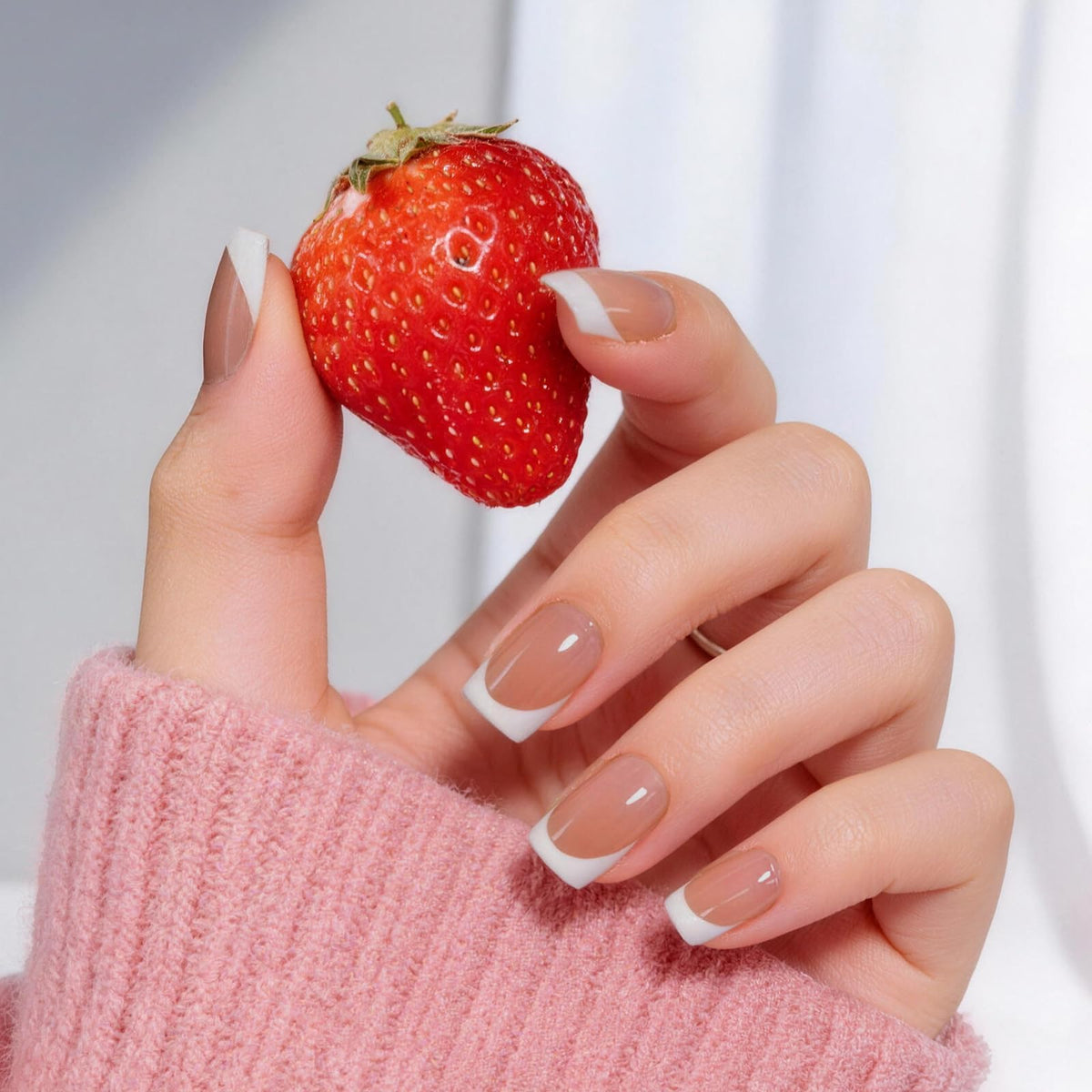 Bioday French Tip Press-On Nails Short Square showcase a chic, salon-grade finish for quick manicures.