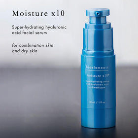 Hand applying Bioelements Moisture x10 serum for smoother skin