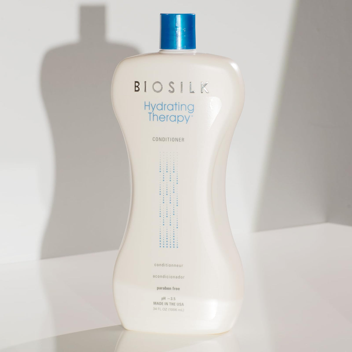 BioSilk conditioner on bathroom shelf illustrating home-use convenience.