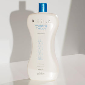 BioSilk conditioner on bathroom shelf illustrating home-use convenience.