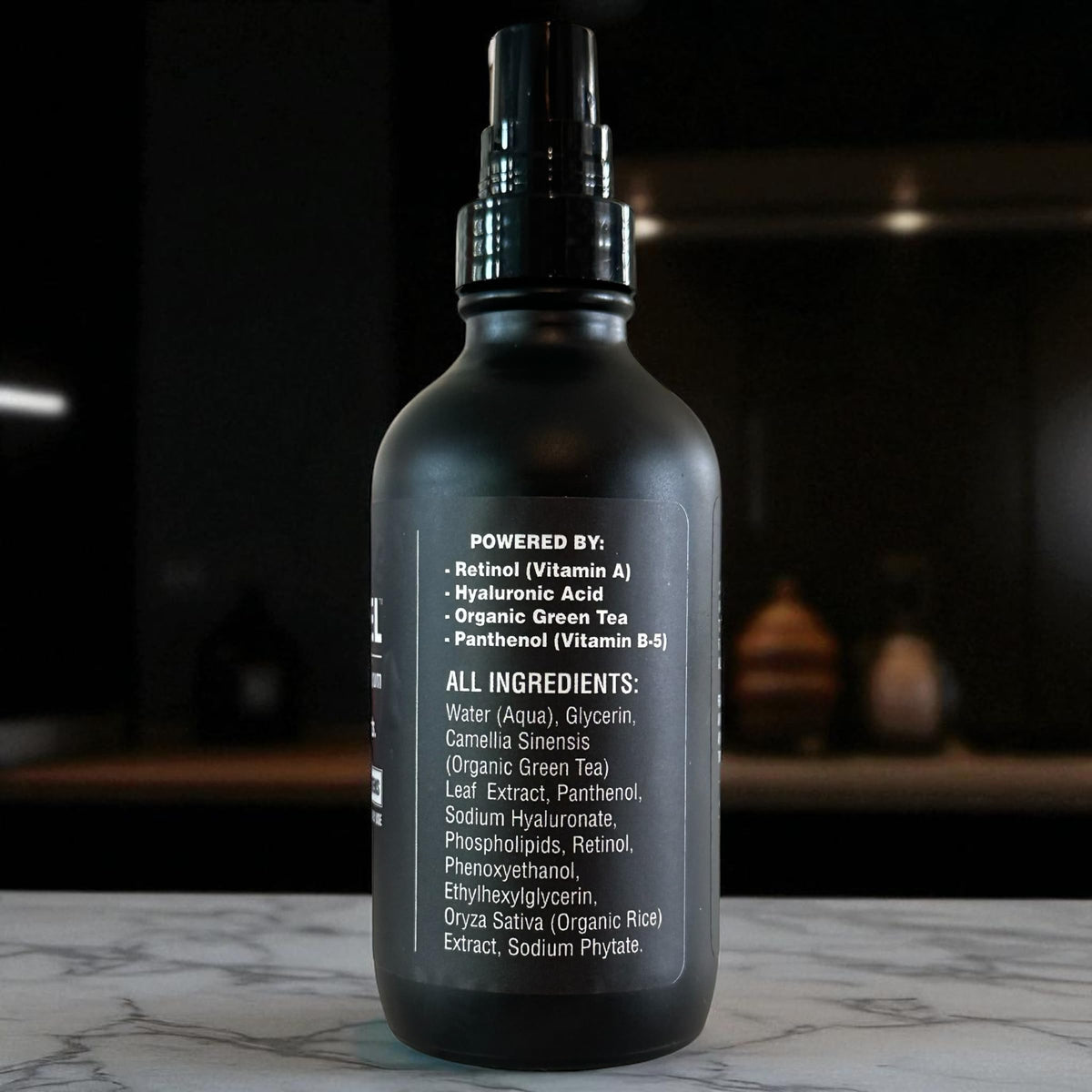BLACKSTEEL packaging matte black glass evokes premium, one-step skincare for men.