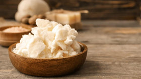 Bless International ivory-white mango butter packaging highlighting Grade A purity.