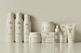 BlondMe shampoo lather close-up emphasizes nourishing cleansing for light blonde hair.