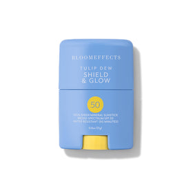 Bloomeffects Tulip Dew Shield SPF 50 stick applying for a smooth, invisible glow.