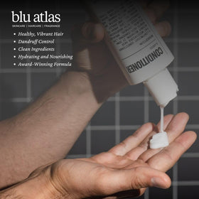 Blu Atlas conditioner showing argan oil application for nourished shine and softness.