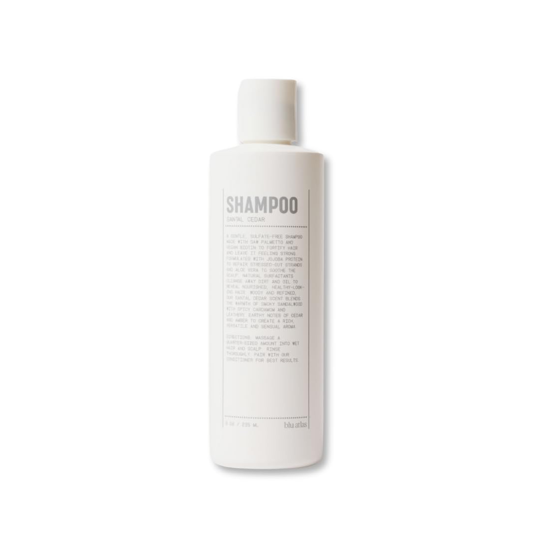 Blu Atlas Men's Natural Shampoo Santal Cedar scent close-up showcases travel-friendly packaging for on-the-go cleansing.