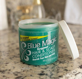 Blue Magic Bergamot conditioner being massaged into scalp for gentle nourishment