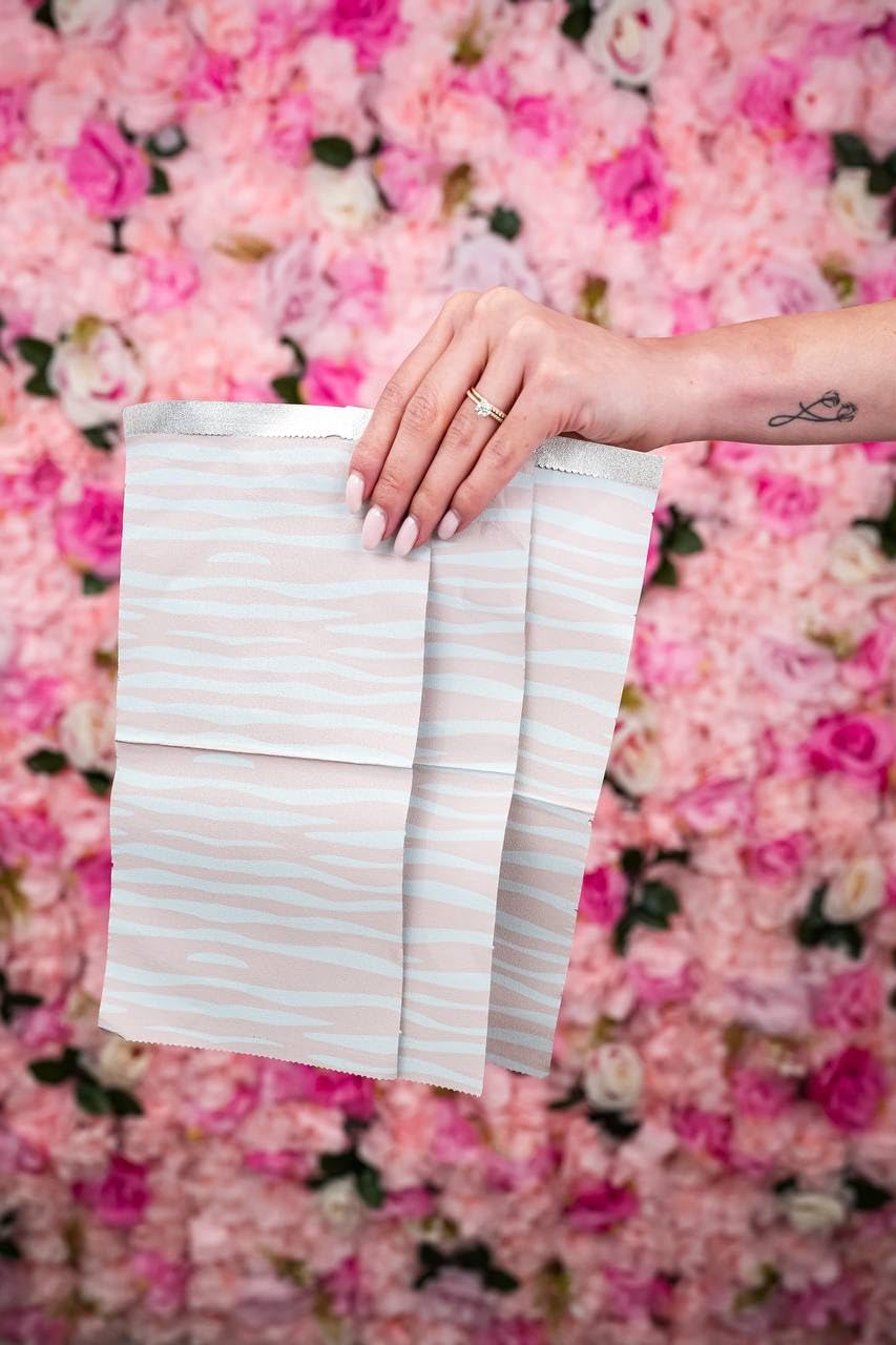 Close-up of embossed Pink Zebra foils for precise balayage.