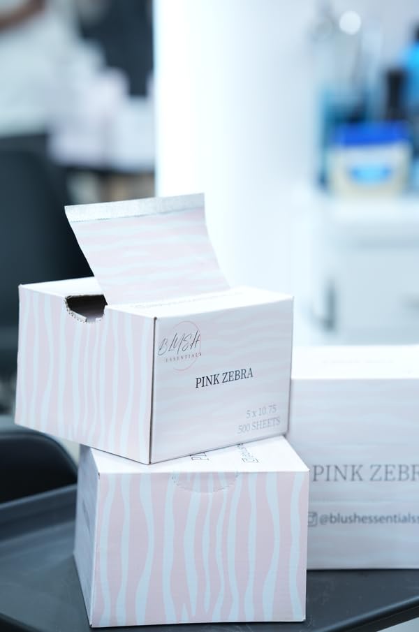 Salon-ready packaging shows Pink Zebra branding and foil sheets.