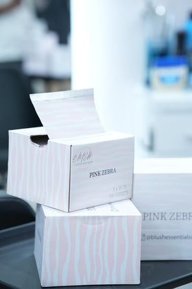 Salon-ready packaging shows Pink Zebra branding and foil sheets.