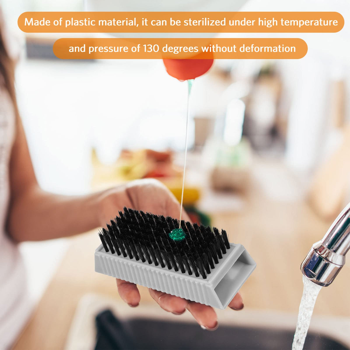 Boao scrub brush in use, aiding under-nail dirt removal.