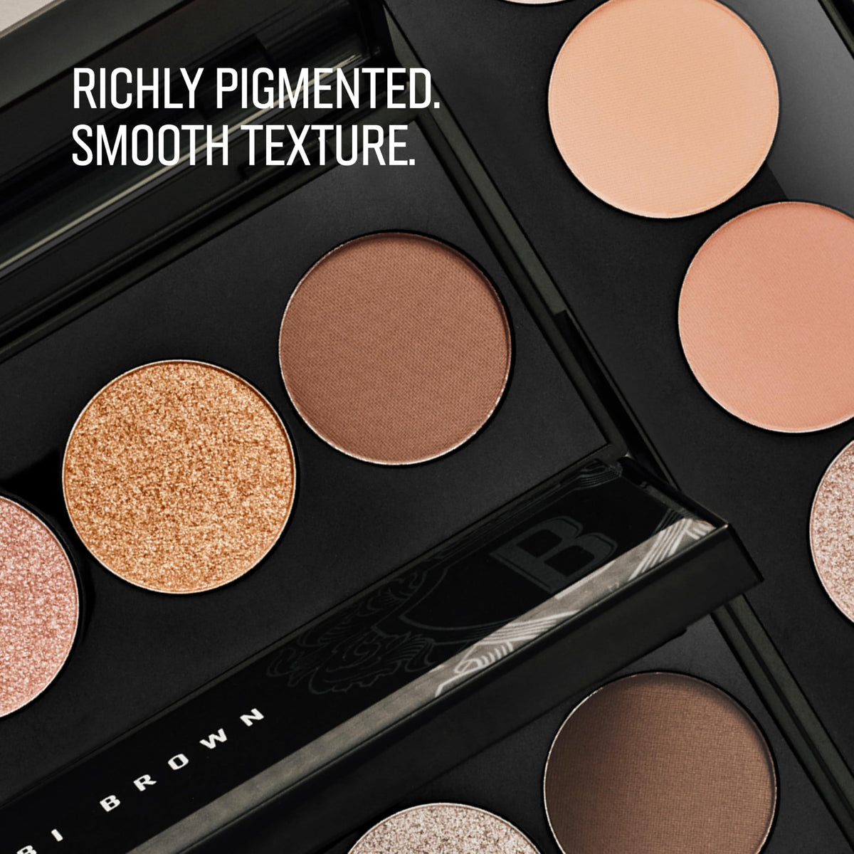 Bobbi Brown All Nudes Palette close-up highlights peachy-nude tones with a silky texture.
