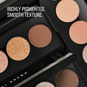 Bobbi Brown All Nudes Palette close-up highlights peachy-nude tones with a silky texture.