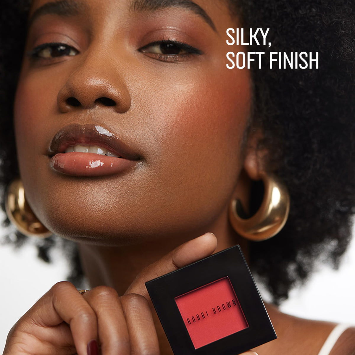 Bobbi Brown Blush natural-flush enhances complexion with balanced pigment.