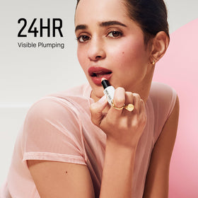Bobbi Brown Extra Lip Tinted Balm highlights olive, jojoba, and avocado oils for conditioned lips.
