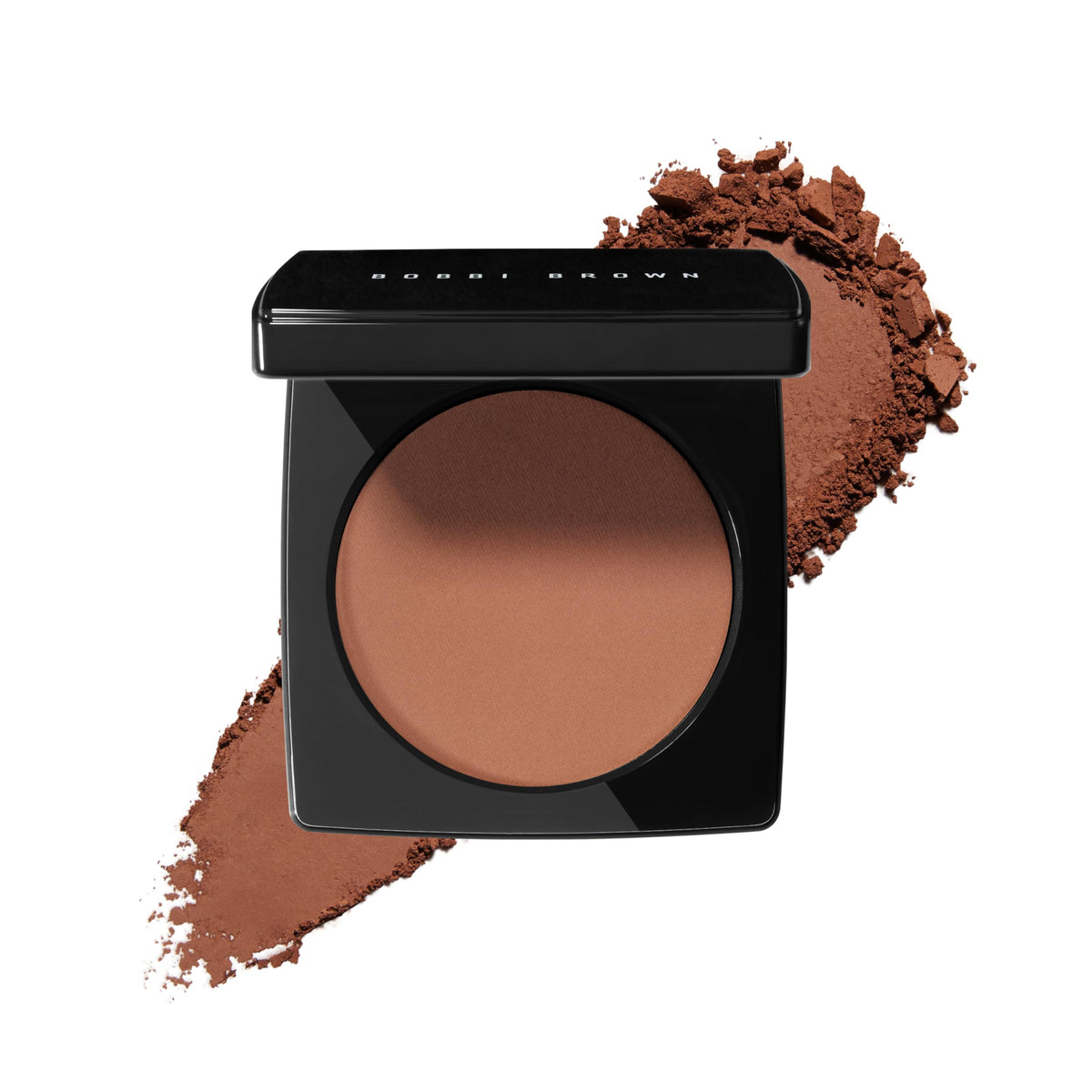 Bobbi Brown Bronzing Powder compact closeup highlights silky, buildable warmth.