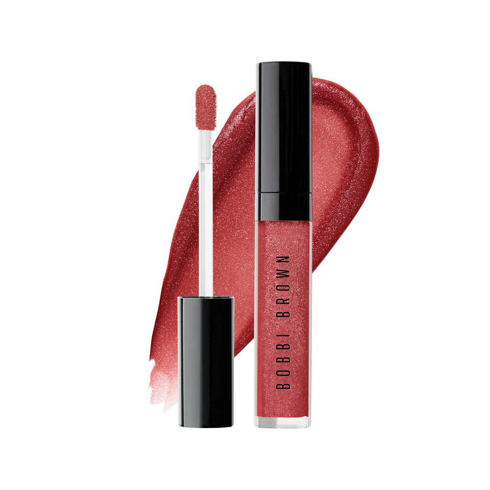 Bobbi Brown Crushed Oil-Infused Gloss bottle closeup showing hydration and shine.