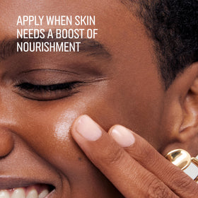 Bobbi Brown Extra Face Oil texture drop highlights a silky finish that isn’t greasy.