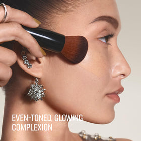 Bobbi Brown Intensive Serum Foundation pump close-up showing creamy texture for smooth, buildable coverage.