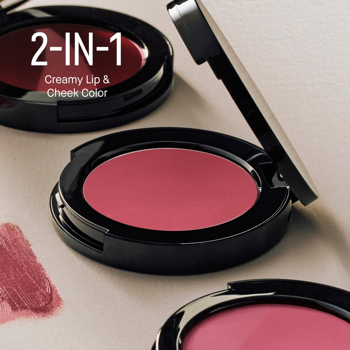 Close-up of Pot Rouge being dabbed onto lips for color.