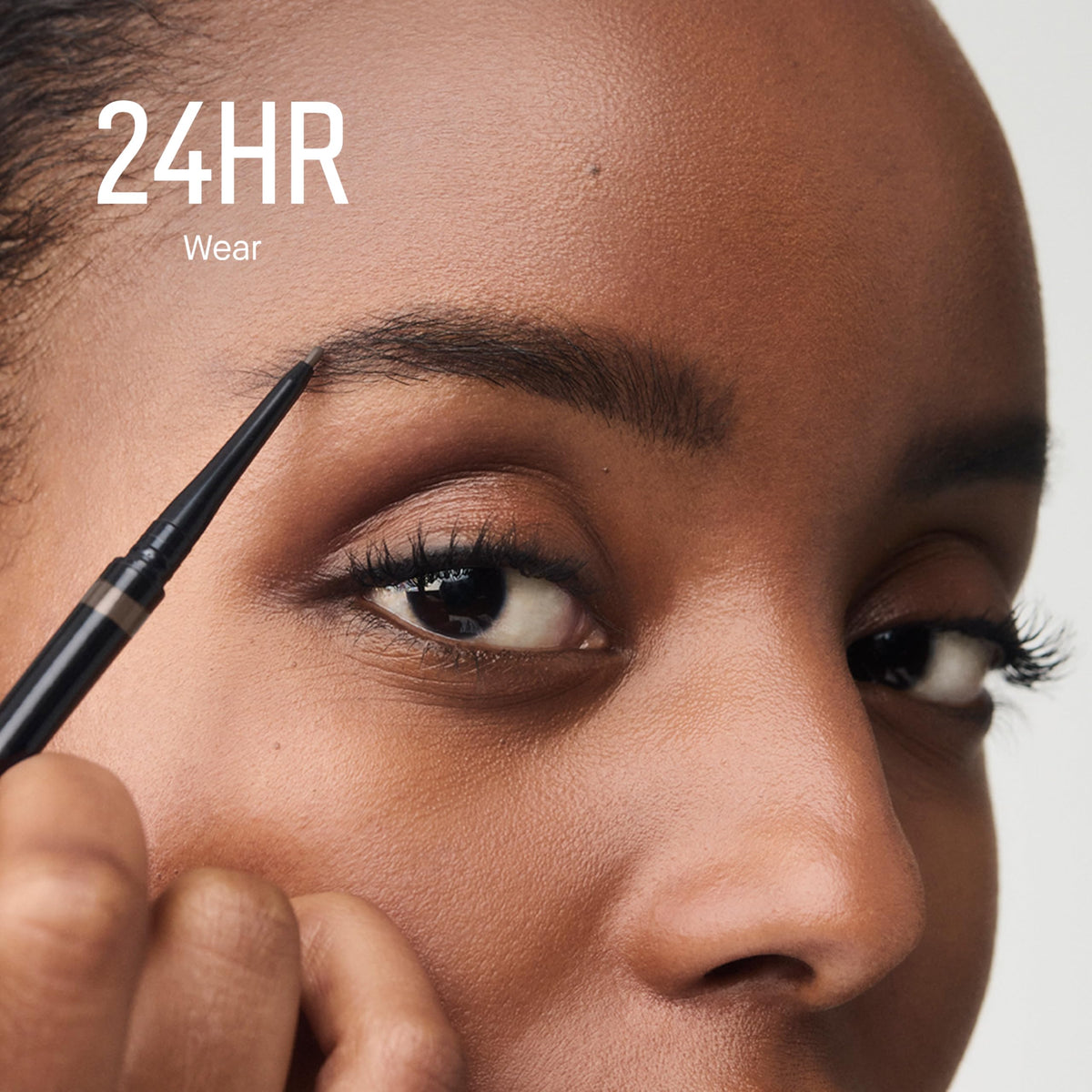 Bobbi Brown Precise Brow Pencil illustrating natural-stroke brow look.