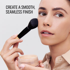 Bobbi Brown Sheer Finish Loose Powder application brush enables quick blending for a seamless finish