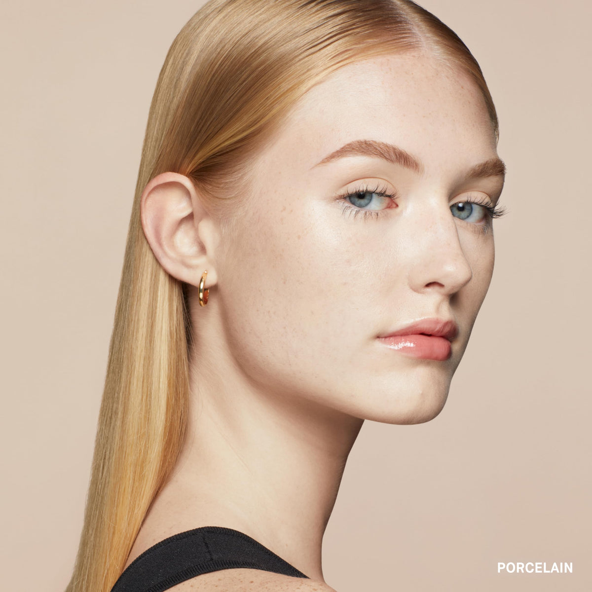 Bobbi Brown concealer applied around the eyes to even discoloration for a natural look.