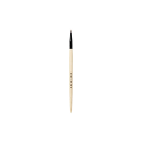 Bobbi Brown Ultra Precise Eyeliner Brush with a sharp tapered head for precise lines.