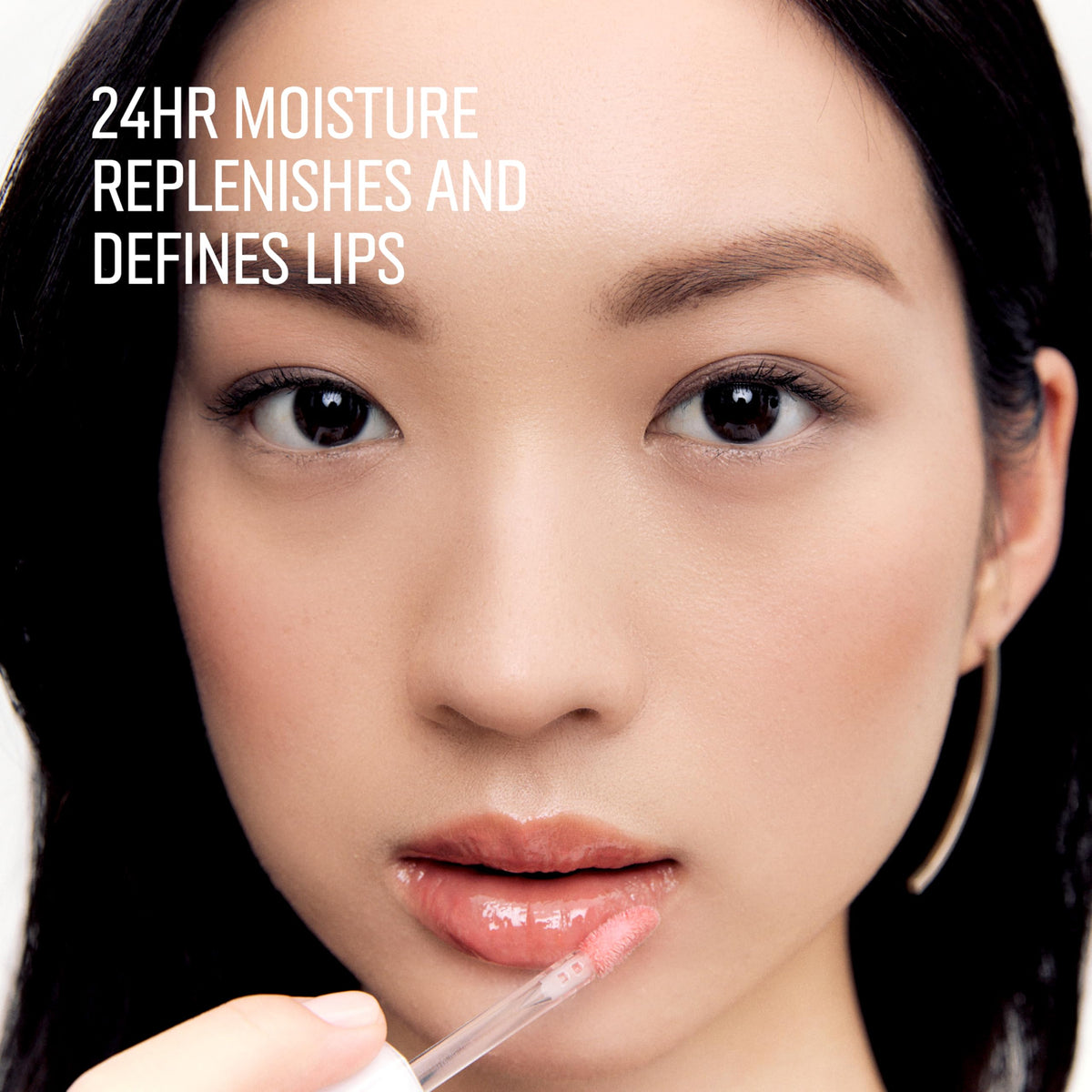 Bobbi Brown Extra Plump Lip Serum glossy shine on Bare Rose lips.