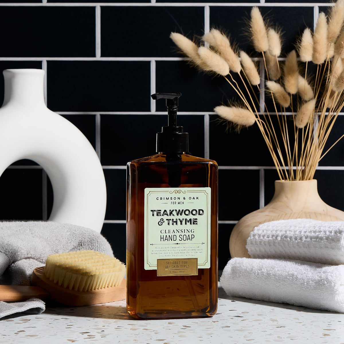 Body Prescriptions Crimson & Oak hand soap pump bottle shown in kitchen or bathroom use.