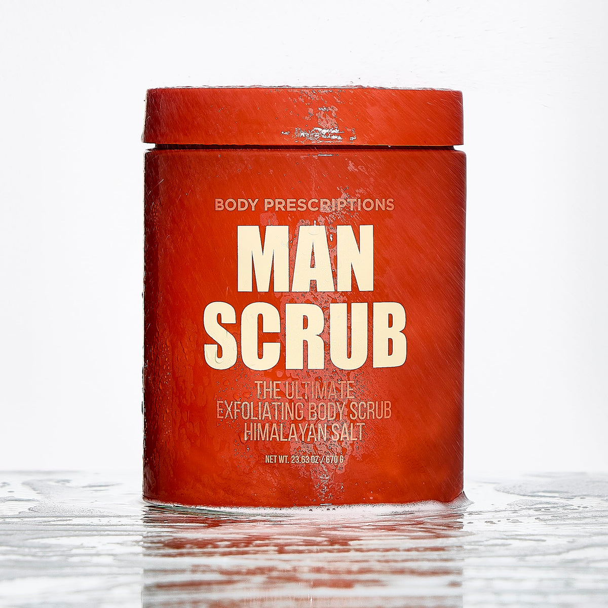 Body Prescriptions Men's Exfoliating Scrub application shot showing use on skin.