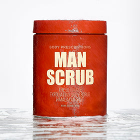 Body Prescriptions Men's Exfoliating Scrub application shot showing use on skin.