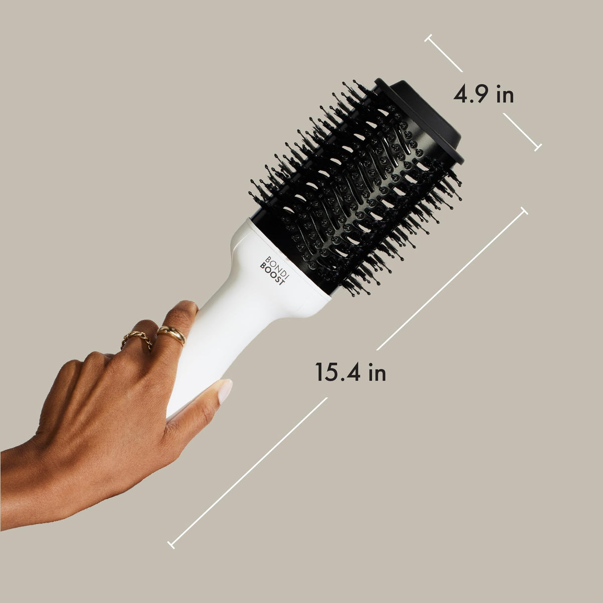 BondiBoost Blowout Brush Pro dual bristles detangle and smooth hair.