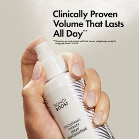 BONDIBOOST Thickening Hair Spray application demonstrates even distribution for fuller hair.