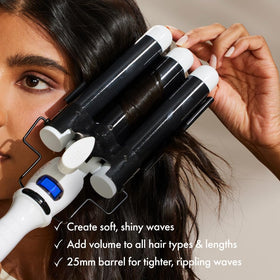 Hands styling hair with BondiBoost Wave Wand in action.